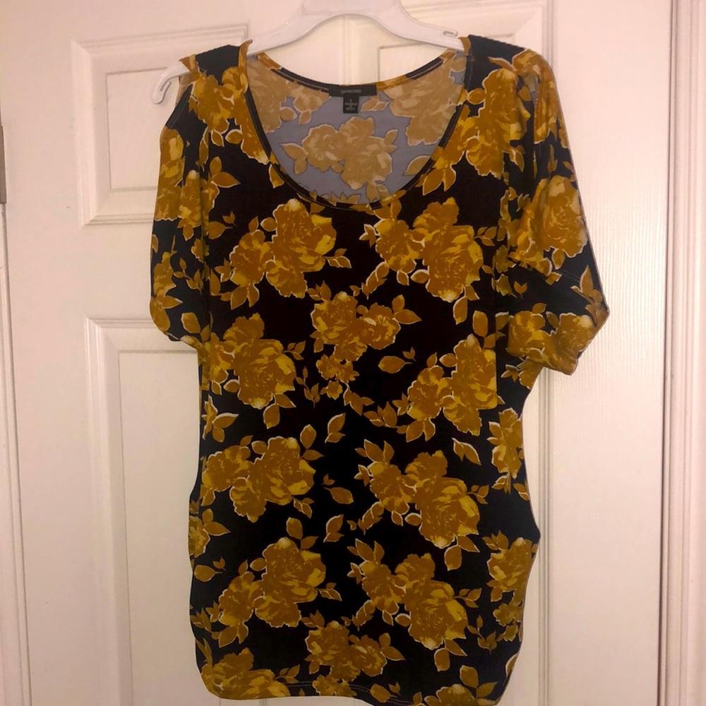 Knit blouse with pretty yellow flowers in a black background.